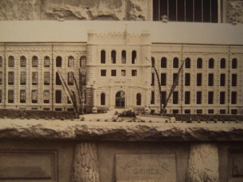 DSCF2476.JPG - A stone model of the new cellhouse and Hospital Building was on public display on the south side of the Administration Building for many years.  Small pieces are all that's left, some of which are on display in the Penitentiary Museum.