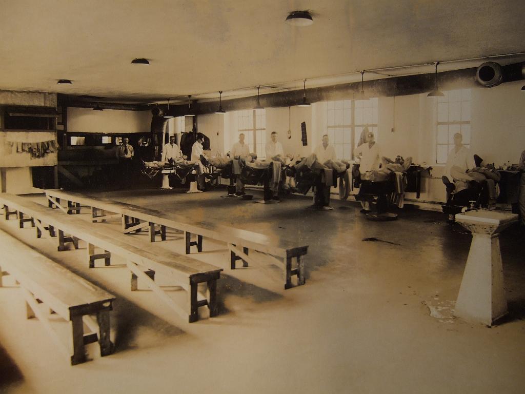 DSCF2512.JPG - Prison barber shop, with "customers" in chairs